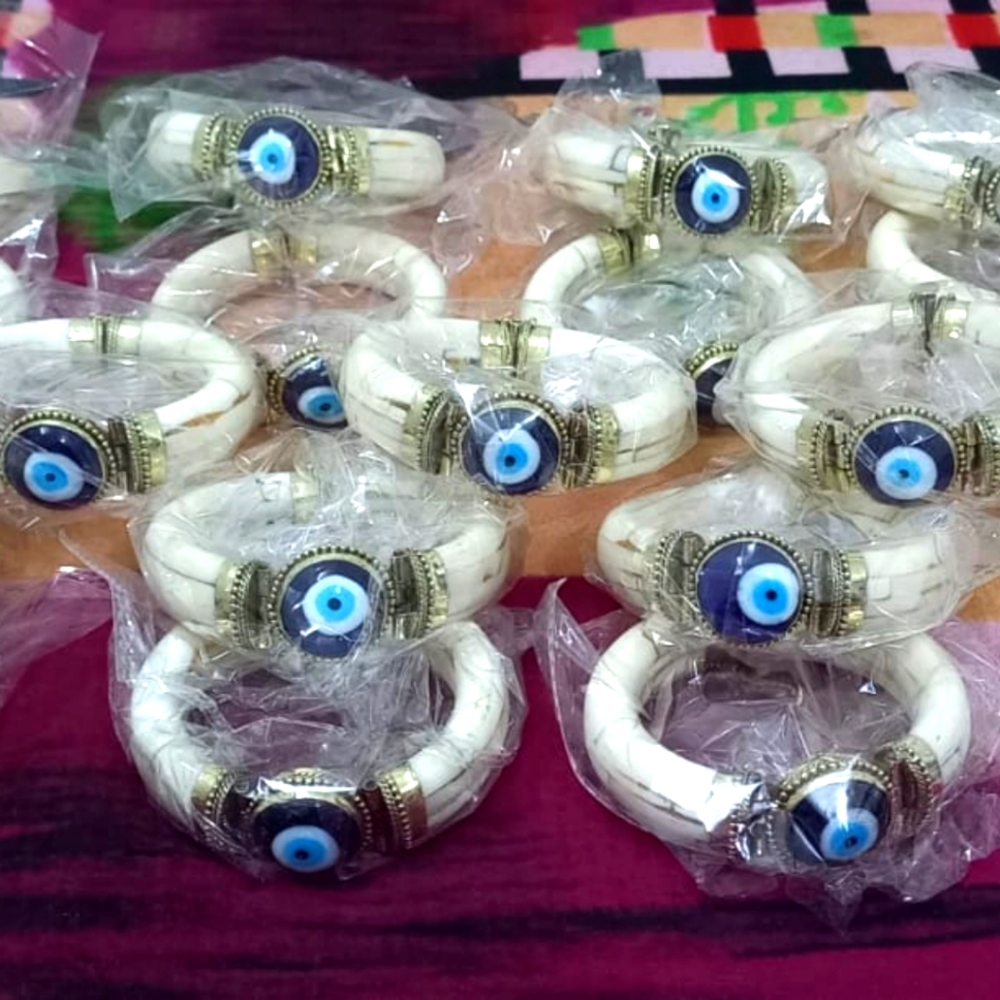 Ten (10) Evil Eye Bone Bangle Bracelets